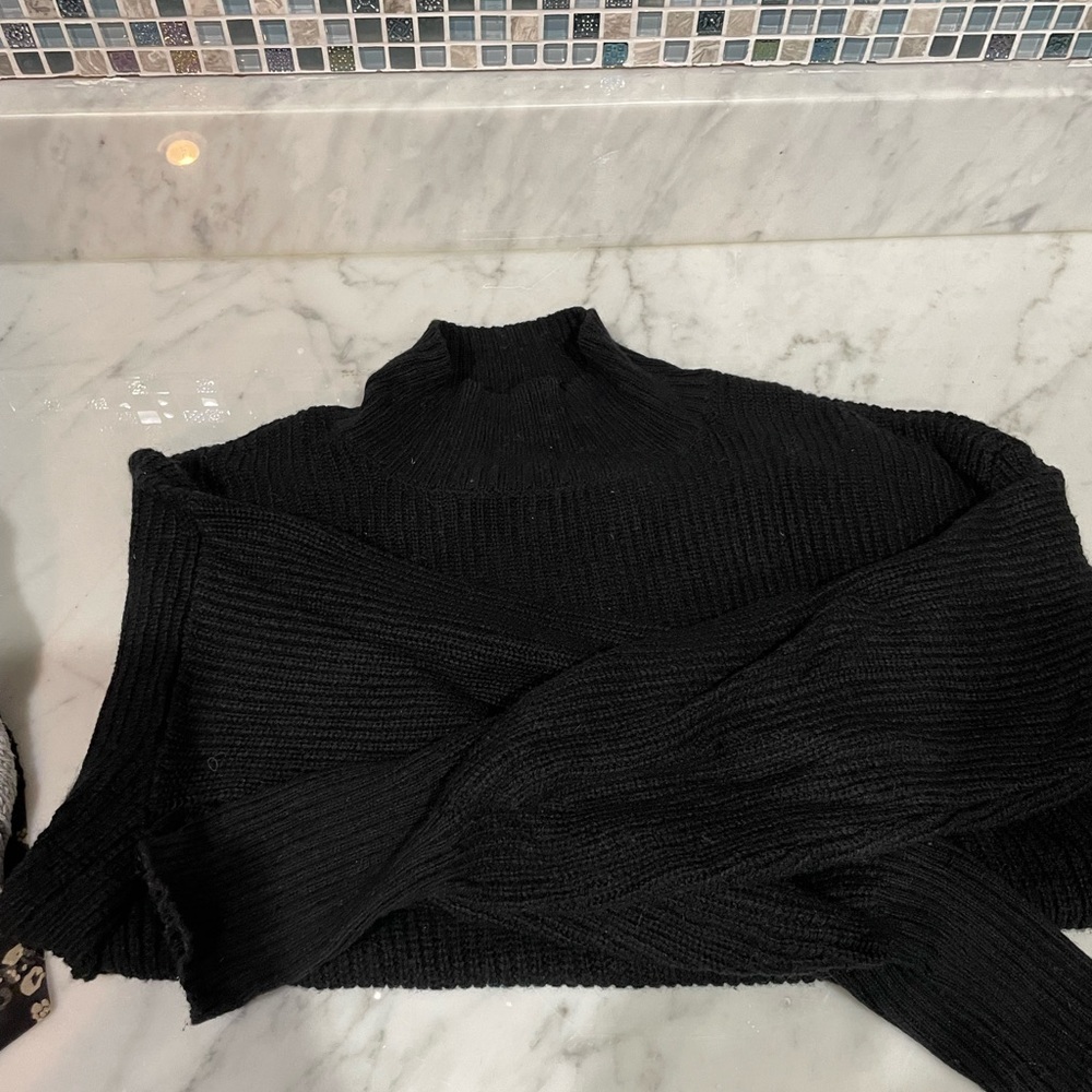 Black turtleneck sweater